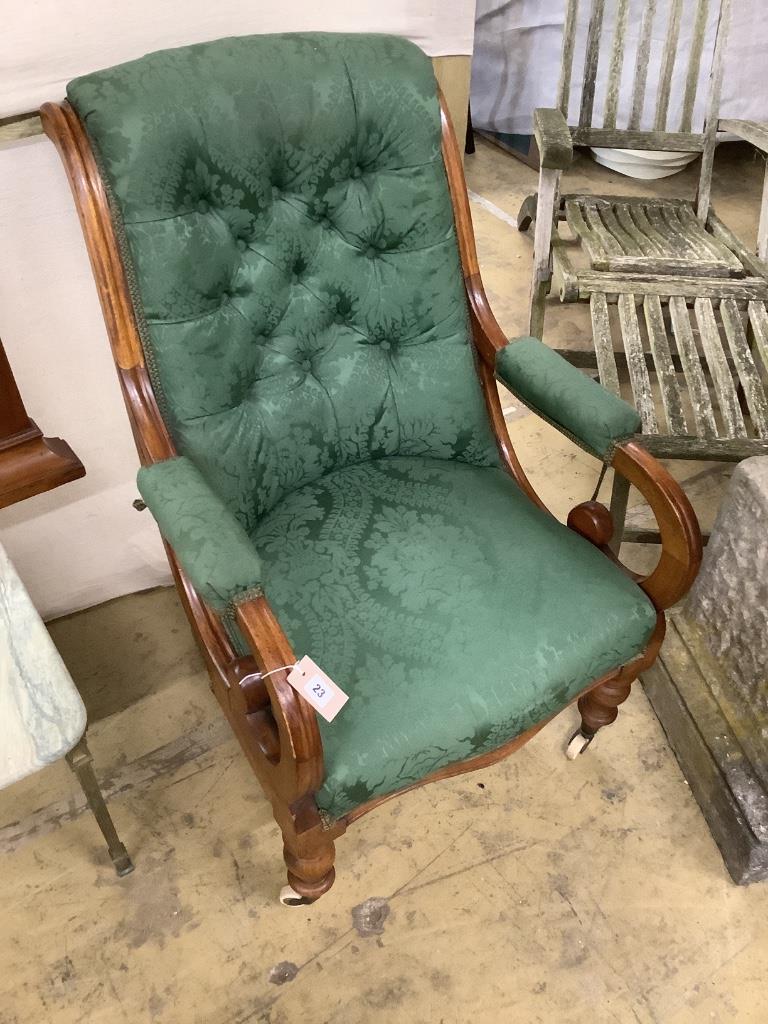 A mid Victorian upholstered mahogany armchair, width 66cm, depth 70cm, height 94cm